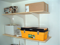 two shelves in a garage supported with concealed brackets